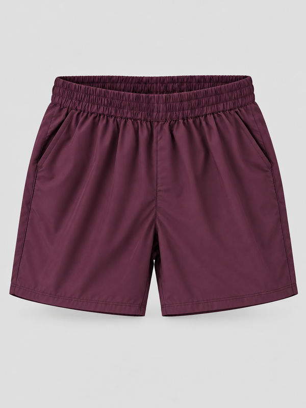 A pair of dark plum purple shorts with an elastic waistband, displayed flat against a light gray background.