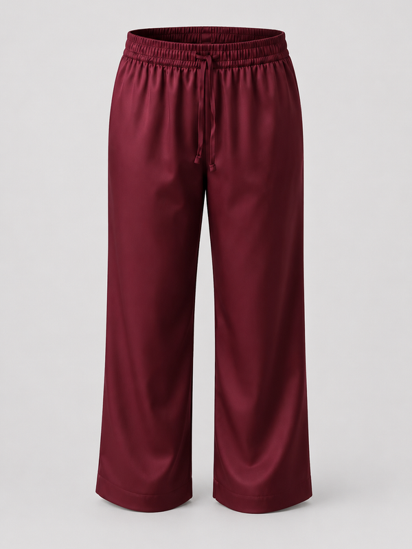A pair of wide-leg cropped pants in a deep burgundy color, featuring an elastic waistband and a drawstring, shown against a light gray background.