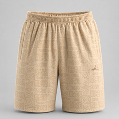Beige shorts with a subtle pattern on a gray background
