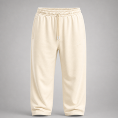 Beige sweatpants on a gray background