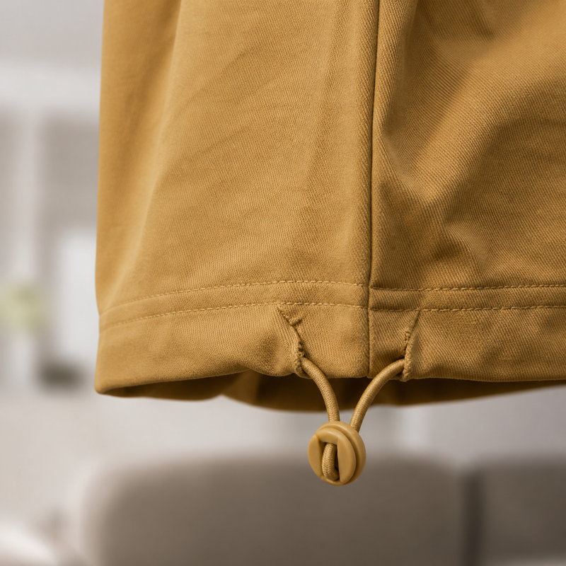 Close-up of a Mustard yellow jacket with a blurred background