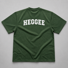 Forest Green V Neck t shirt with 'HEGGEE' printed on back against gray background