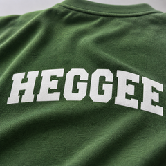 Forest Green t-shirt with HEGGEE logo on back side