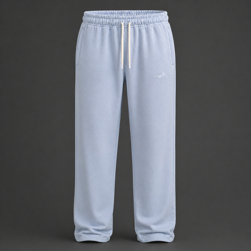 Light blue sweatpants with a small logo on a dark gray background