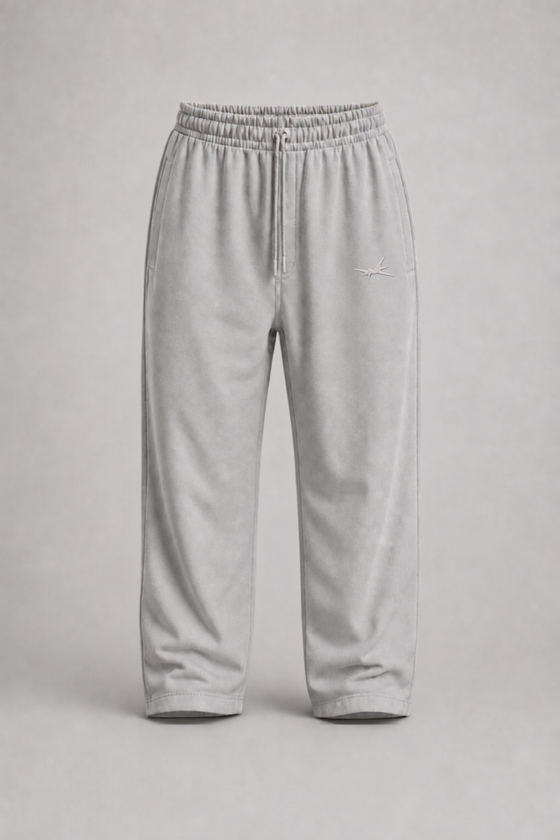 Light gray fleece sweatpants with an elastic waistband and drawstring, shown against a neutral gray background.