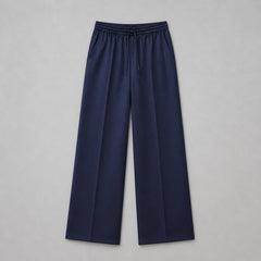 Navy blue wide-leg pants on a gray background