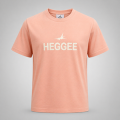 Peach-colored t-shirt with 'HEGGEE' logo on a gray background