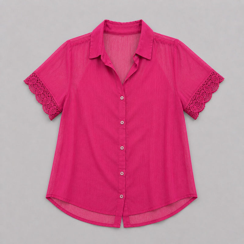 Pink blouse with lace trim on a gray background
