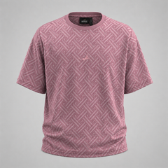 Pink patterned t-shirt with a brand label on a gray background