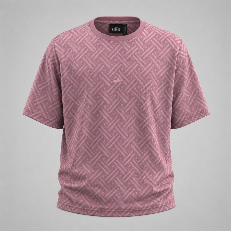Pink patterned t-shirt with a brand label on a gray background