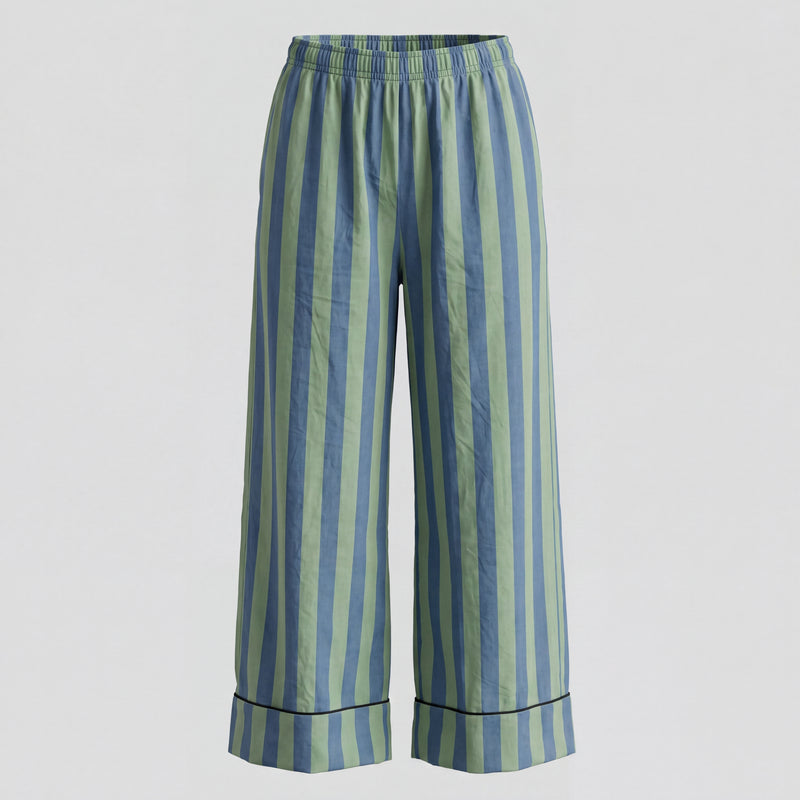 Striped pants with blue and green vertical stripes on a light gray background