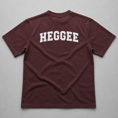 Wine t-shirt with HEGGEE printed on back against gray background